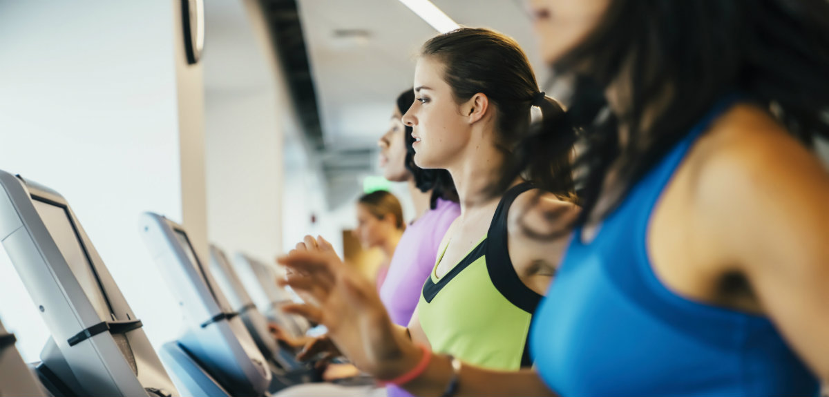 Group of women on treadmills at the gym